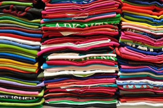 Stack of Colorful t-shirt for use as Background