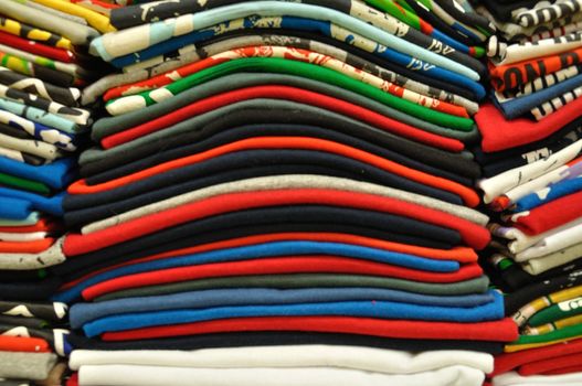 Stack of Colorful t-shirt for use as Background