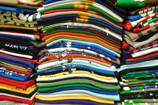 Stack of Colorful t-shirt for use as Background