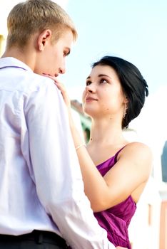 Young attractive couple on street