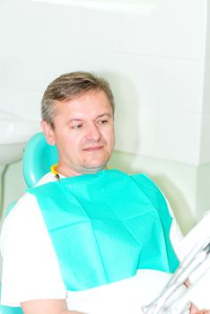 Portrait of men visiting dentist