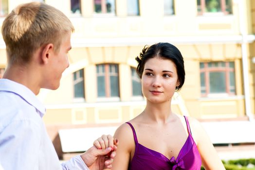 Young attractive couple on street