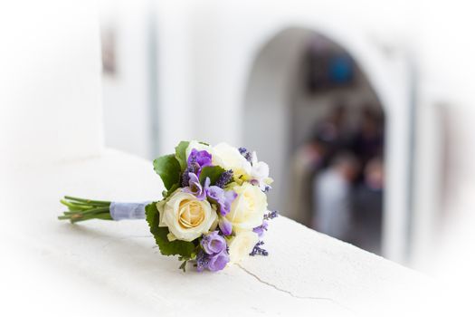 Wedding bouquet with yellow roses and lavender flowers