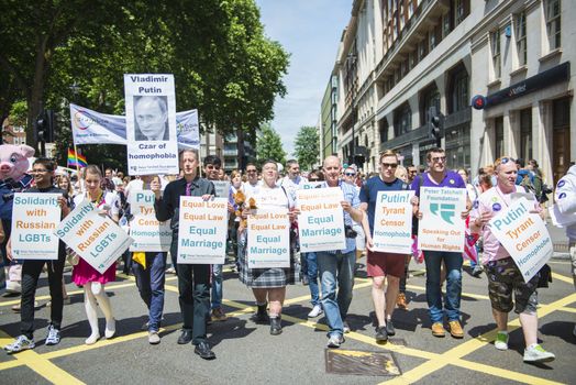 LONDON, UK - JUNE 29: Participants at the gay pride protesting against Vladimir Putin in Baker Street. June 29, 2013 in London.