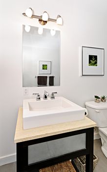 Interior bathroom vanity and mirror - artwork on walls are from photographer portfolio