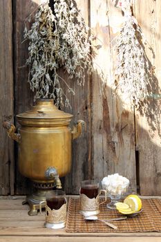 Still Life with a Russian tea cups and old