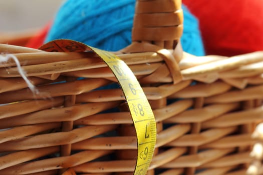 red and blue balls of yarn for needlework