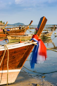 Fishing boats on the sea shore in Phuket, Thailand