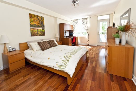 Bedroom interior with hardwood floor - artwork is from photographer portfolio