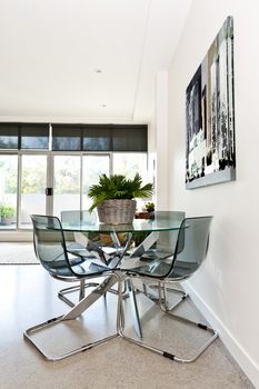 Dining table and chairs in loft apartment - artwork from photographer portfolio