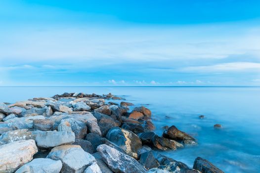 Stone breakwater in the Mediterranean sea, Italy