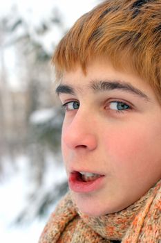 frozen teenager stand on hard frost