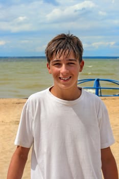 Happy teenager on the beach