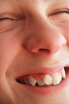 happy laughing boy face close-up