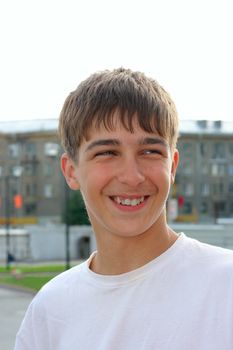 smiling young and happy boy portrait outdoor