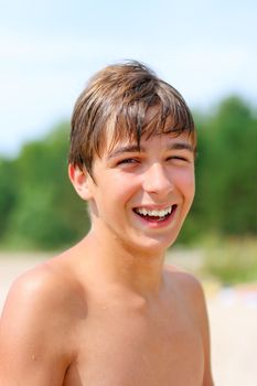 Happy teenager on the beach