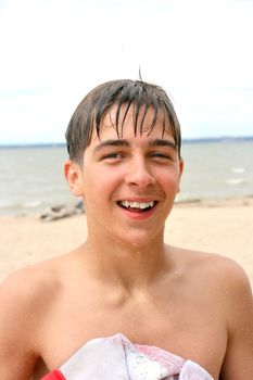 Happy teenager on the beach