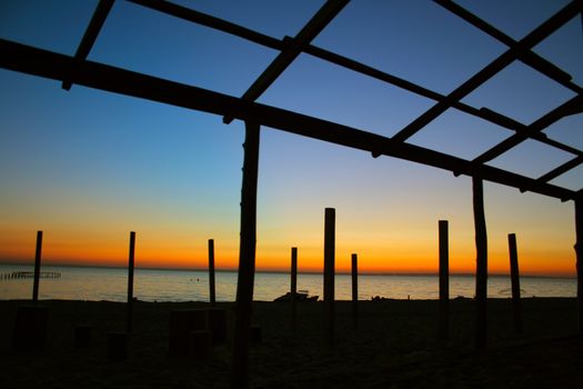 seaside evening landscape with ruinous building