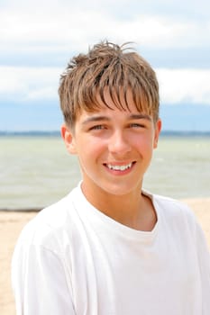 Happy teenager on the beach