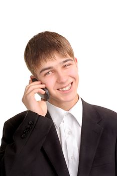 The smiling teenager speaking by phone