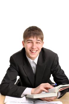 smiling tennager sitting with a books