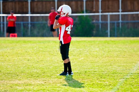 Youth football player on the field