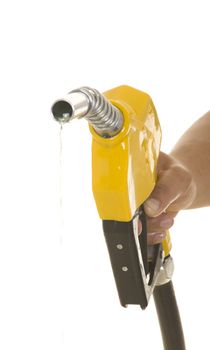 Male hand wasting gas with yellow pump isolated on white