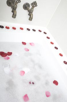 Bath water with rose petals