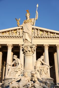The Austrian Parliament and Athena Fountain in Vienna, Austria