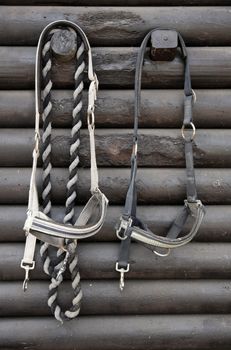 Details of diversity used horse reins, background the log cabin