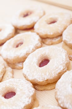 Closeup of Traditional Linzer Cookies on Wooden Board - Shallow Depth of Field