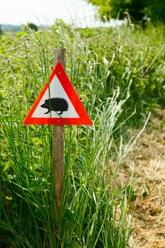 Hedgehog crossing road sign in Englang