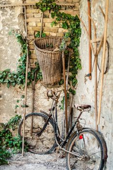 Antique bicycle in a rural alley