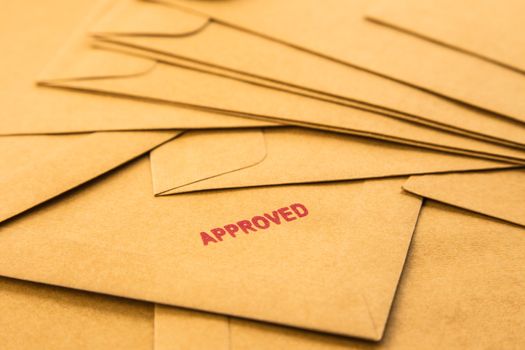 red approved sign on envelope, recruitment and human resources