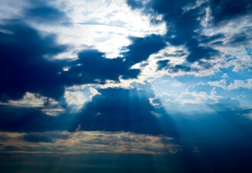 Dramatic sky with clouds and beams of light