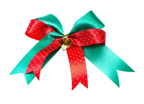 red and green ribbon bow with small bell isolated on white