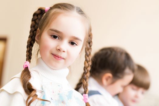 portrait of a girl in an apron, the kids involved in art school