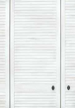 White modern wooden door in Shabby shic or Provence style. Vertical wooden background