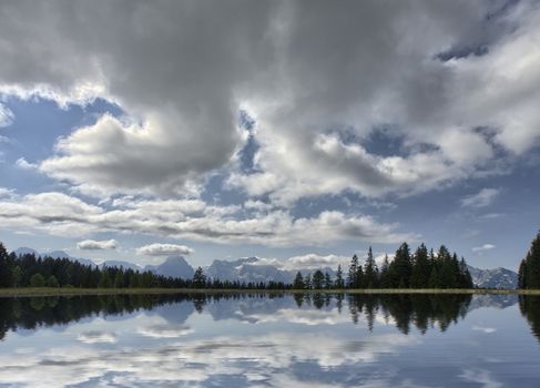 The panorama of the lake in the forest