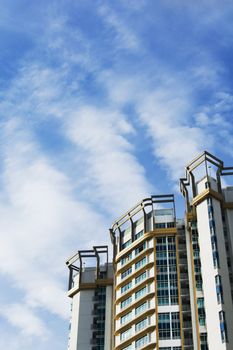 high rise apartments with sky background