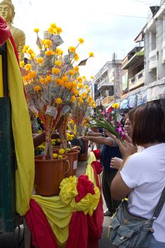 Phrae,Thailand - October 31,2012 : Unidentified Buddhist monks is given food offering from people at the morning on End of Buddhist Lent Day. on october 31, 2011 in Muang, Phrae, Thailand.