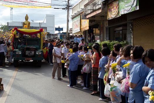 Phrae,Thailand - October 31,2012 : Unidentified Buddhist monks is given food offering from people at the morning on End of Buddhist Lent Day. on october 31, 2011 in Muang, Phrae, Thailand.