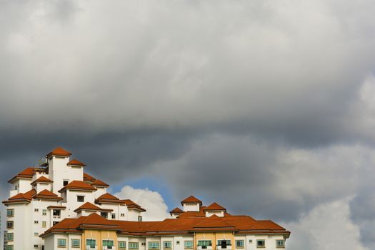 high rise apartments with sky background