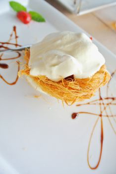 Little sweet nest with cream and chocolate