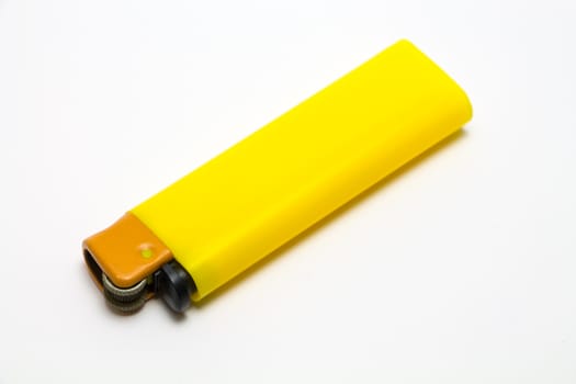 Yellow Lighter isolate on a white background.