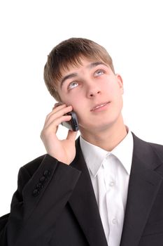 The smiling teenager speaking by phone