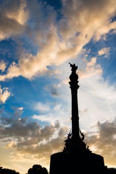 Columbus statue in Barcelona at sunset sky background
