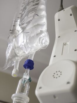 Close up of a infusion and SOS telephone in hospital