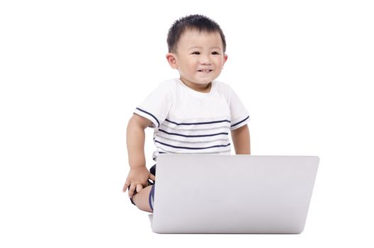 Smart boy with a computer