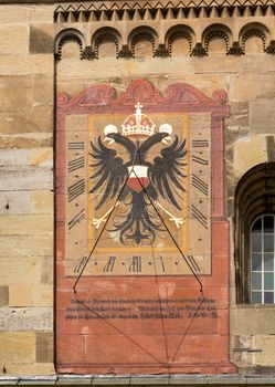 Detail of the 1746 church clock and astronomical phases of moon on medieval church of St Michael in the town square of Schwabisch Hall in Germany